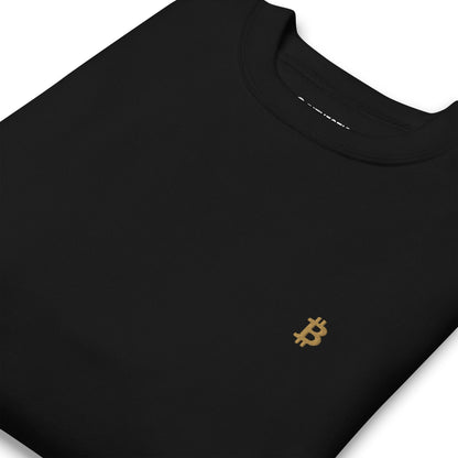 Zoomed: Schwarz: Klassischer Bitcoin Pullover in Schwarz mit goldenem ₿-Stick auf der Vorderseite.
